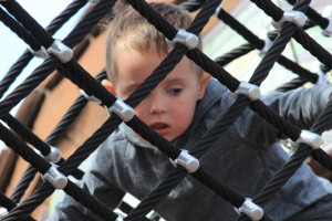 Young Declan on the climbing fame in the playground 